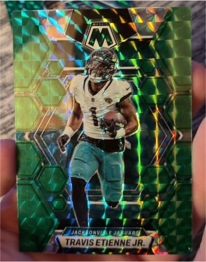 2023 Panini Mosaic #103 Travis Etienne Jr. Green Mosaic Prizm — front
