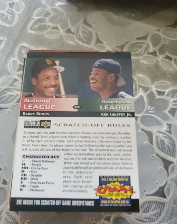 1994 Upper Deck Collector's Choice #NNO Barry Bonds vs Ken Griffey Jr. Scratch-Off — front