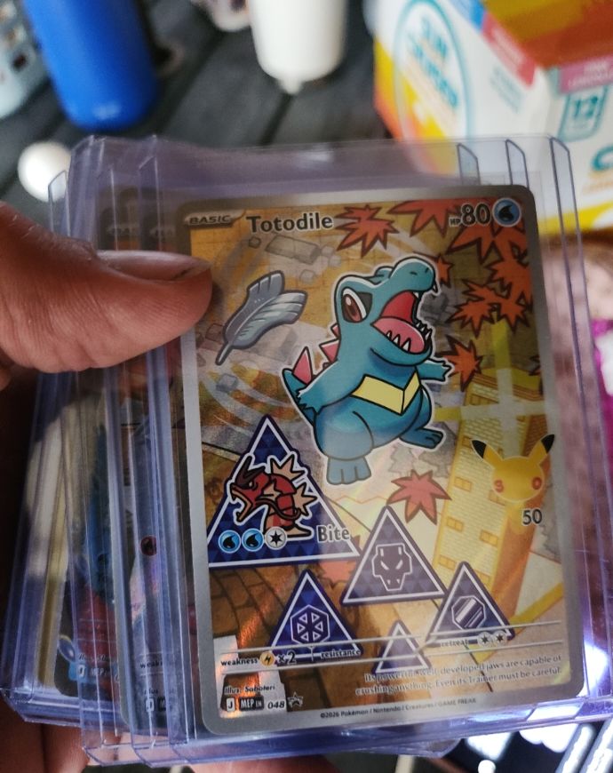 2026 Pokémon #048 Totodile Mega Evolution Promo — front