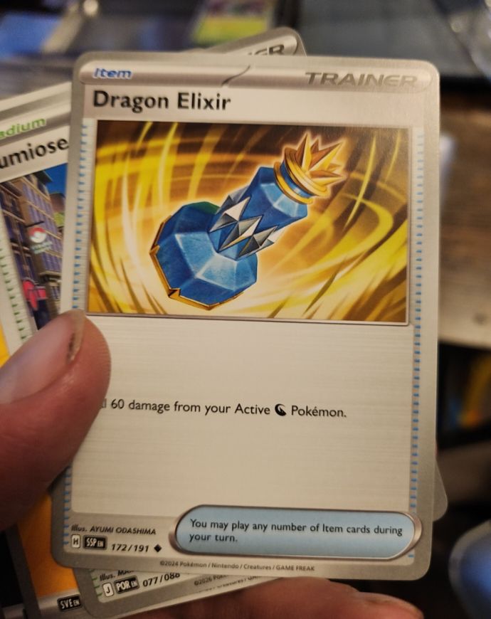 2024 Pokémon SV08: Surging Sparks #172 Dragon Elixir — front