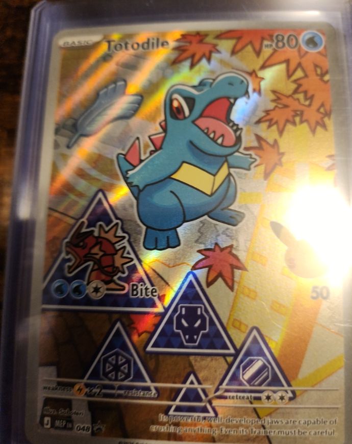 2026 Pokémon #048 Totodile Mega Evolution Promo — front