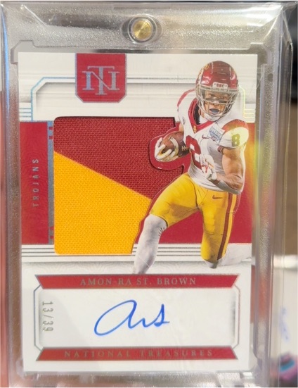 2025 Panini National Treasures #13 Amon-Ra St. Brown — front