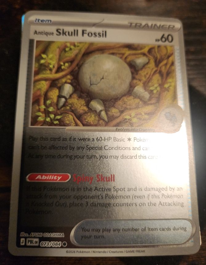 2026 Pokemon Antique Skull Fossil #073 — front