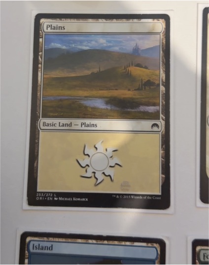2015 Magic: The Gathering #253 Plains — front