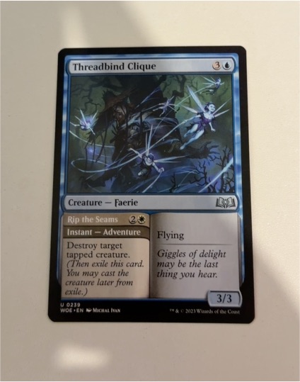2023 Wilds of Eldraine #239 Threadbind Clique — front