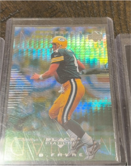1999 Upper Deck Black Diamond Myriad #M4 Brett Favre — front