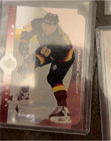 1995 Upper Deck Stars #E28 Alexander Mogilny — front