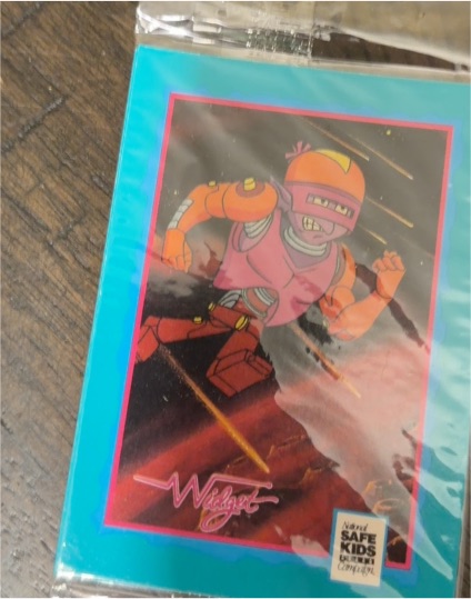 1991 Impel Trading Card Treats Widget — front