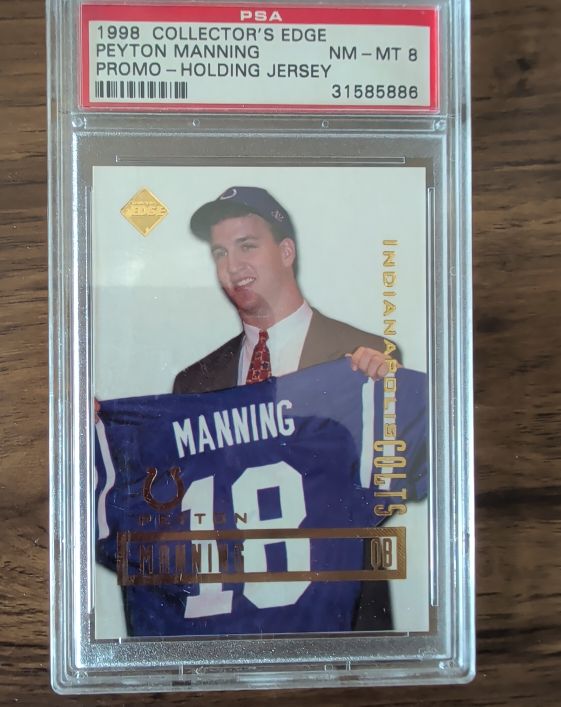1998 Collector's Edge Peyton Manning Promo Holding Jersey — front