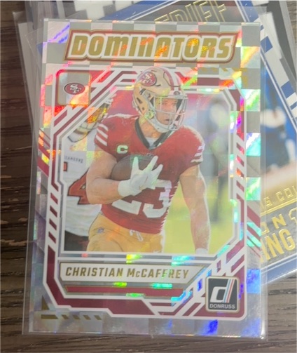 2025 Panini Donruss Dominators #DOM-CMY Christian McCaffrey — front