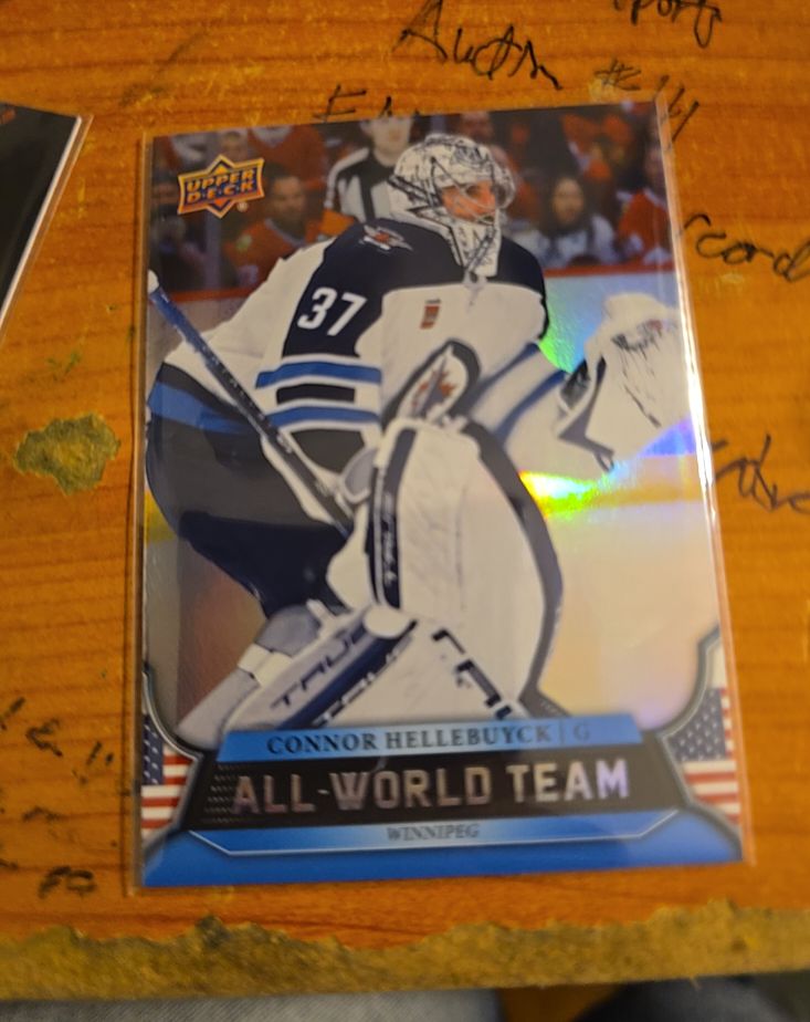 2025-26 Upper Deck Extended Series All-World Team #AWT-9 Connor Hellebuyck — front