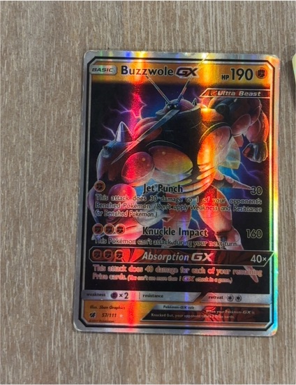 2017 Pokemon TCG SM Crimson Invasion #57 Buzzwole GX — front