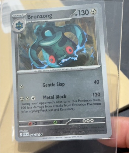 2013 Pokemon ME05: Pitch Black #064 Bronzong — front