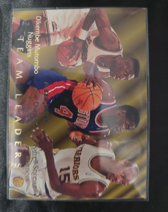 1994-95 Fleer #3 Dikembe Mutombo / Joe Dumars / Latrell Sprewell Team Leaders — front