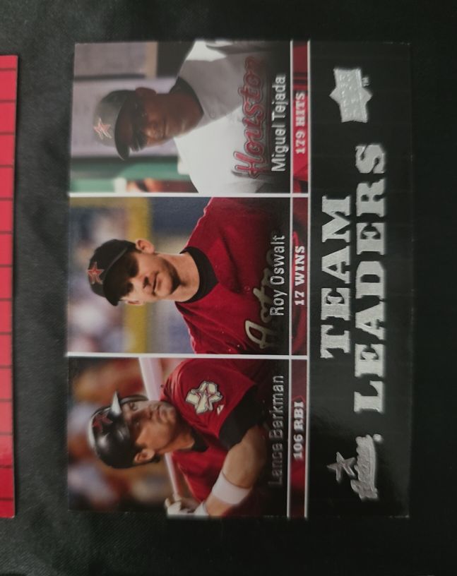 2009 Upper Deck #446 Lance Berkman / Roy Oswalt / Miguel Tejada — front