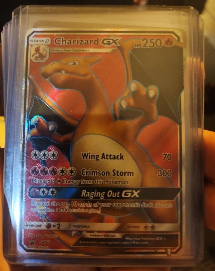 2017 Pokémon SM Black Star Promo #SM60 Charizard GX — front