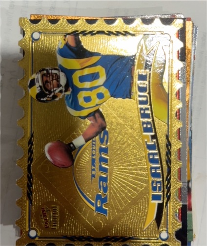 1997 Pinnacle Action Packed 24KT Gold #N16 Isaac Bruce — front