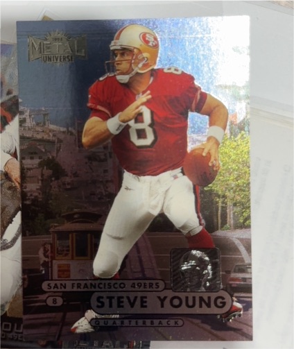 1998 Skybox Metal Universe #17 Steve Young — front