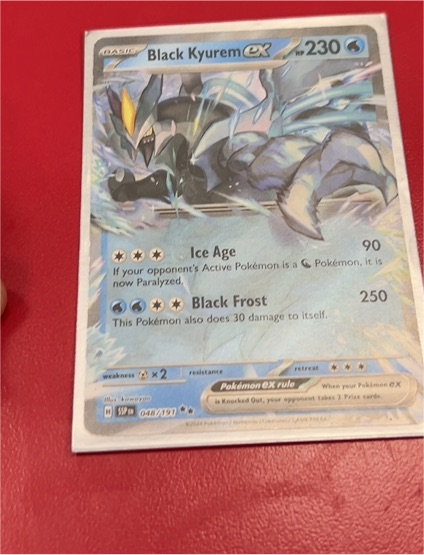 2014 Pokémon SV08: Surging Sparks #048 Black Kyurem ex — front