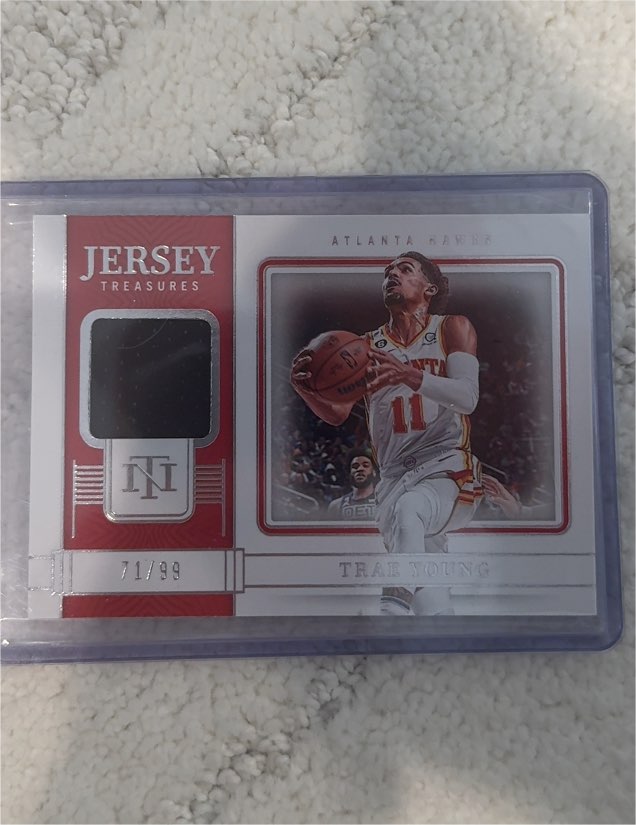 2022-23 Panini National Treasures #JT-ATN Trae Young Jersey Treasures — front