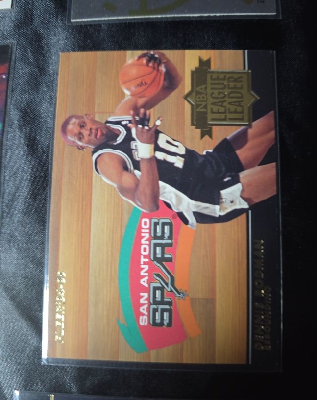 1994-95 Fleer #7 Dennis Rodman NBA League Leaders — front