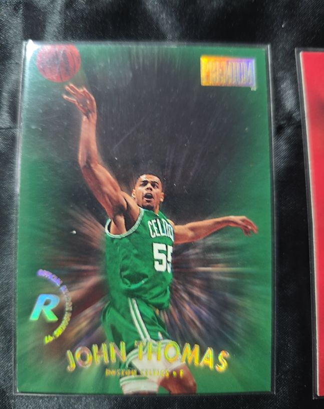 1997-98 Skybox Premium #150 John Thomas — front