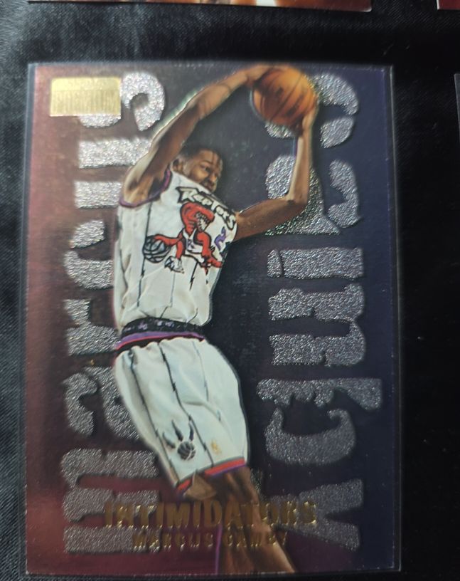 1996-97 Skybox Premium Intimidators #3 Marcus Camby — front