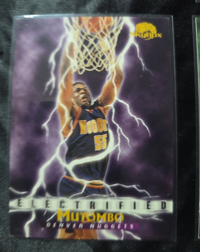 1995-96 SkyBox Premium #282 Dikembe Mutombo Electrified — front