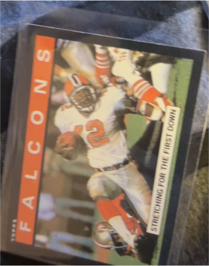 1985 Topps #10 Falcons Team Leaders (Stretching for the First Down) Gerald Riggs — front