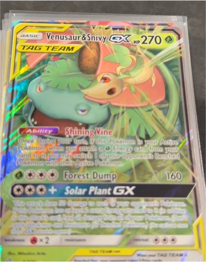 2019 Pokémon TCG SM Cosmic Eclipse #1 Venusaur & Snivy GX — front