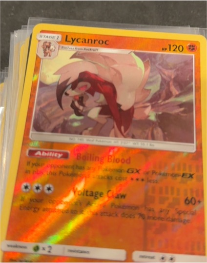 Lycanroc #30 SM Trainer Kit: Lycanroc & Alolan Raichu Holo — front