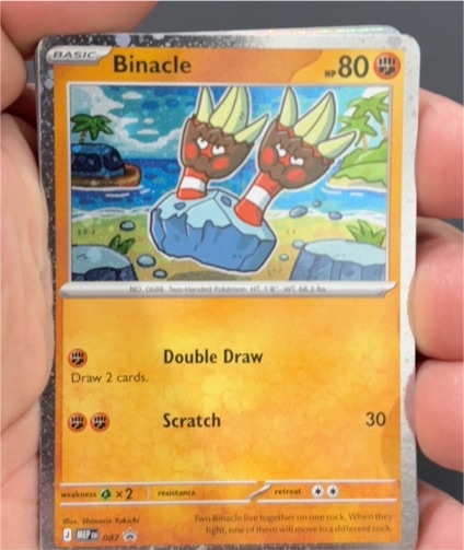 2026 Pokémon #087 Binacle Pitch Black Mega Evolution Cosmos Holo Black Star Promo — front