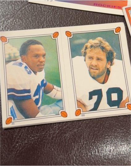 1987 Topps Album Stickers #35-185 Bob Golic Michael Downs — front