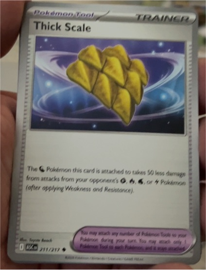 2022 Pokémon Ascended Heroes #211 Thick Scale — front
