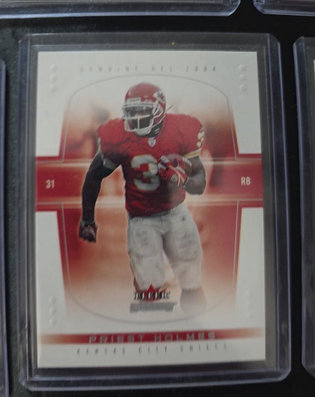 2004 Fleer Genuine #21 Priest Holmes — front