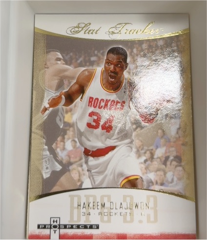 2007-08 Fleer Hot Prospects Stat Tracker #ST-18 Hakeem Olajuwon — front