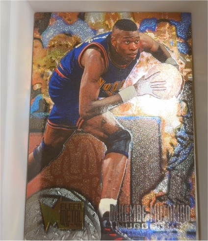 1995-96 Fleer Metal #25 Dikembe Mutombo — front