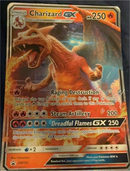 2019 Pokémon SM Black Star Promo #SM195 Charizard GX — front