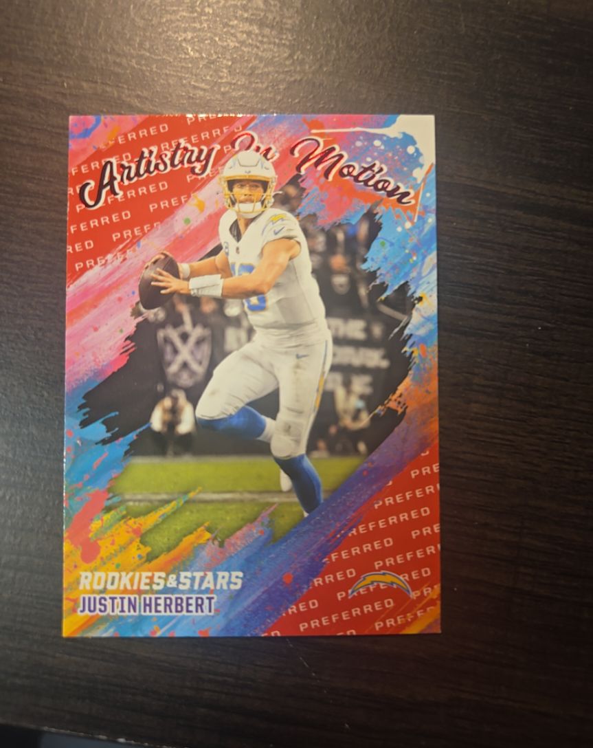 2025 Panini Rookies & Stars #11 Justin Herbert Artistry in Motion — front