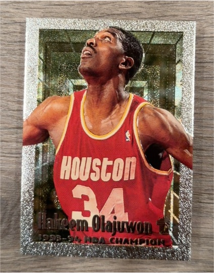 1994-95 Topps Embossed #38 Hakeem Olajuwon Houston Rockets — front