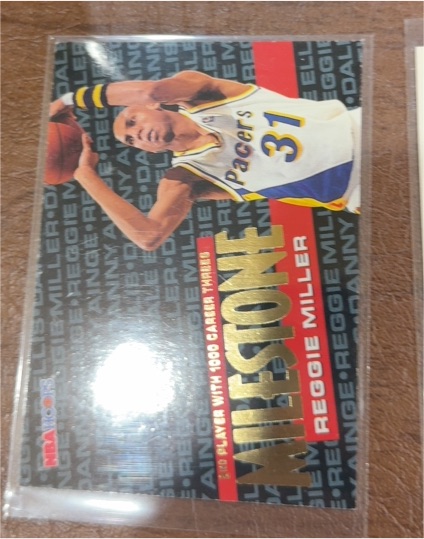 1995 SkyBox Reggie Miller #213 Milestone Indiana Pacers Basketball Card — front