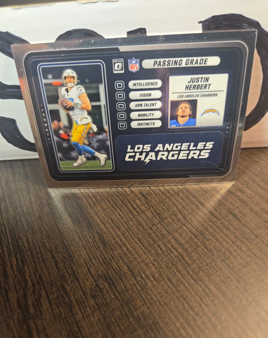 2025 Panini Donruss Optic #10 Justin Herbert Passing Grade — front