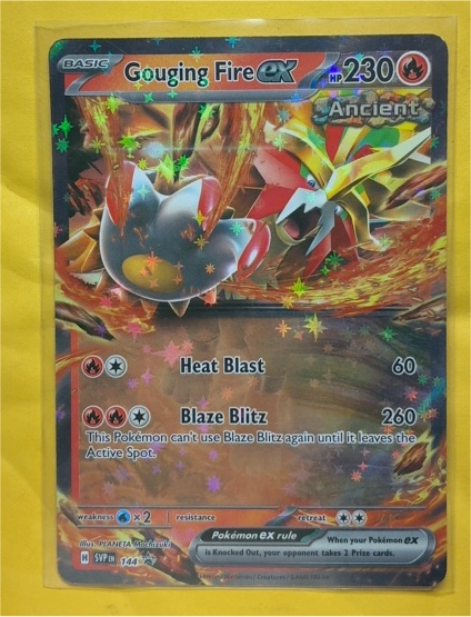 2023 Pokémon Gouging Fire EX SVP 144 — front