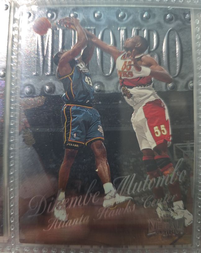 1998-99 Skybox Metal Universe #20 Dikembe Mutombo — front