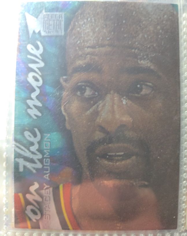 1996-97 Fleer Metal #110 Stacey Augmon On the Move — front