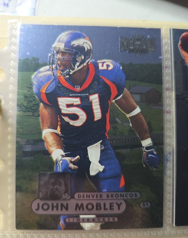 1997 Skybox Metal Universe #90 John Mobley — front