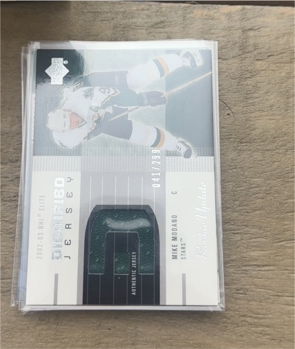 2002-03 Upper Deck Elite Dignified Jersey #041/299 Mike Modano — front