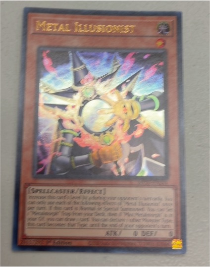 Yugioh 2009 Rage of the Abyss #ROTA-EN008 Metal Illusionist — front