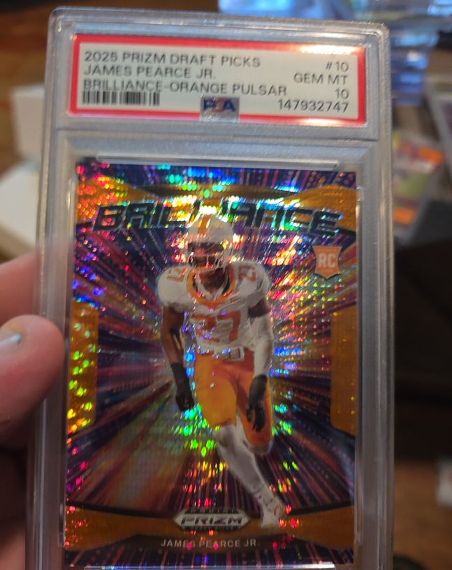 2025 Panini Prizm Draft Picks #10 James Pearce Jr. Brilliance Orange Pulsar — front
