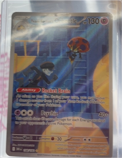 2025 The Pokémon Company Team Rocket's Orbeetle #198/182 — front